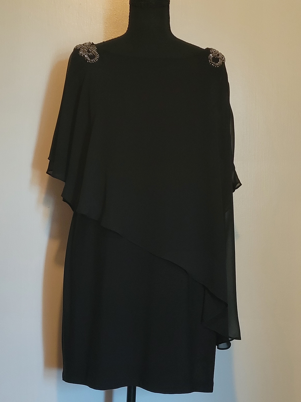 Xscape Black Bateau Neck Asymmetrical Overlay Dress with Embellished Shoulders